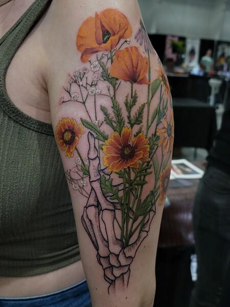 Flower And Skeleton Hand Tattoo