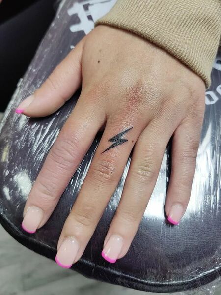 Lightning Bolt Finger Tattoo