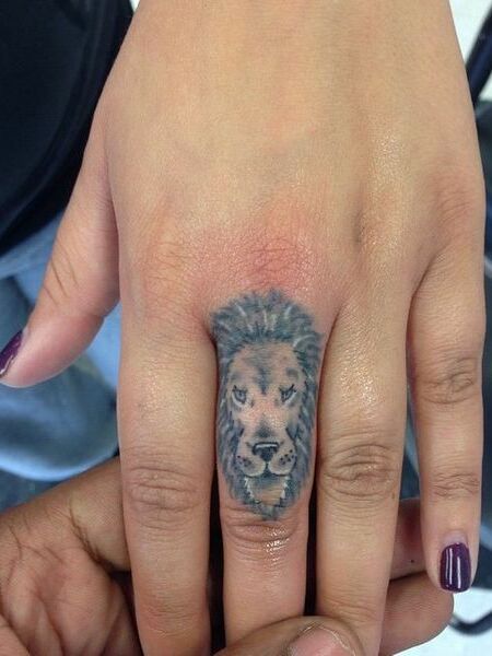 Lion Finger Tattoo