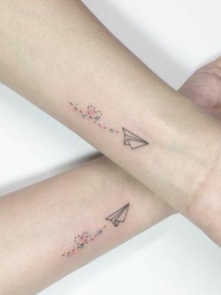 Matching Paper Airplane Tattoo