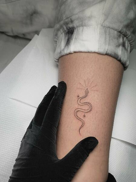 Minimalist Snake Tattoos