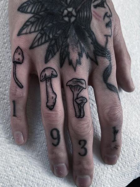 Mushroom Hand Tattoo