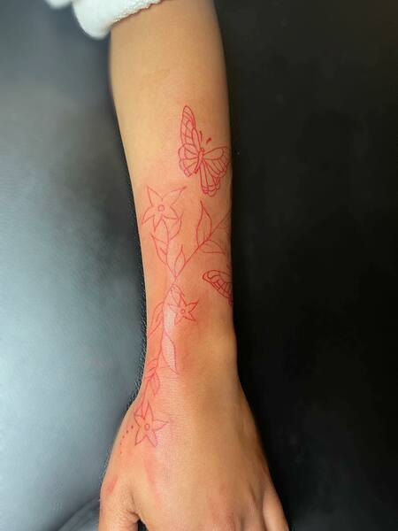 Red Arm Tattoo
