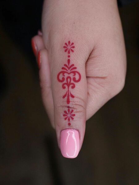 Red Finger Tattoo