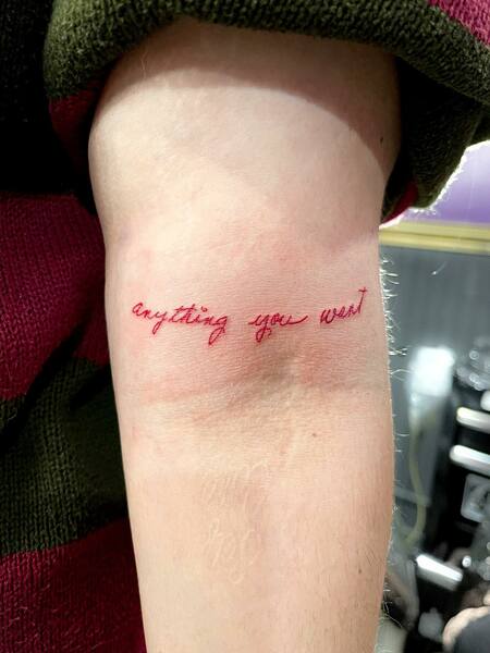 Red Quote Tattoo