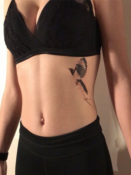 Rib Magpie Tattoo