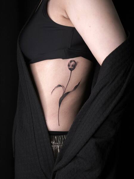 Rib Tulip Tattoo