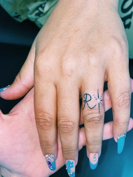 Ring Finger Tattoo