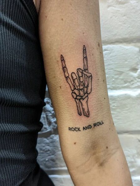 Rock And Roll Skeleton Hand Tattoo