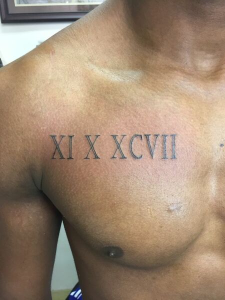 Roman Numerals Chest Tattoos