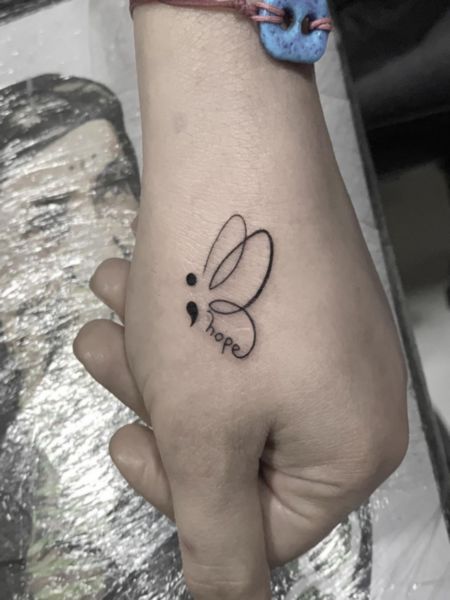 Semicolon Hand Tattoo
