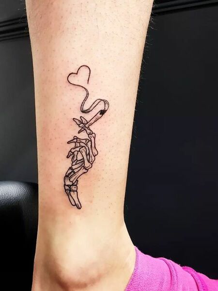 Skeleton Hand Tattoo on Ankle