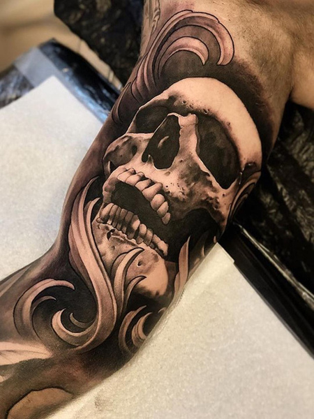 Skull Bicep Tattoo