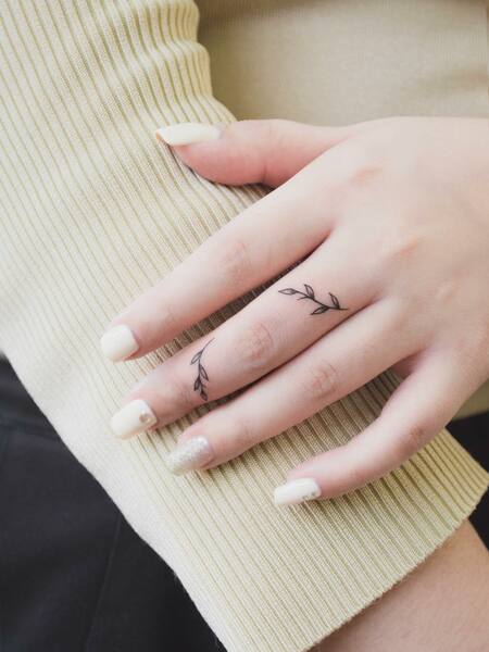 Small Finger Tattoo