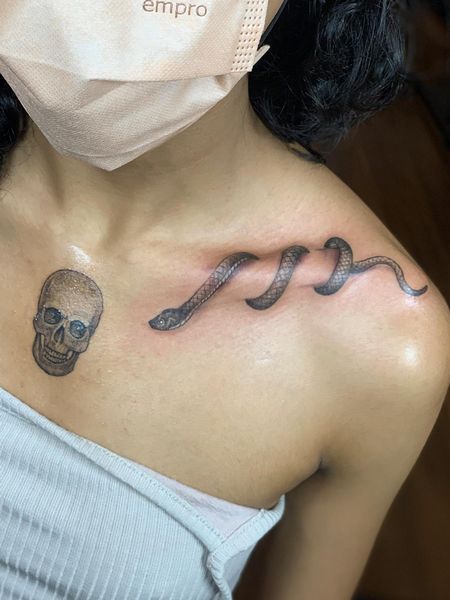 Snake Collarbone Tattoo