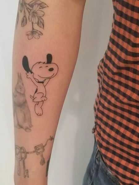 Snoopy Tattoo On Forearm