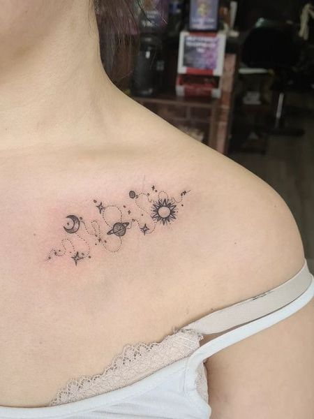 Space Collarbone Tattoo