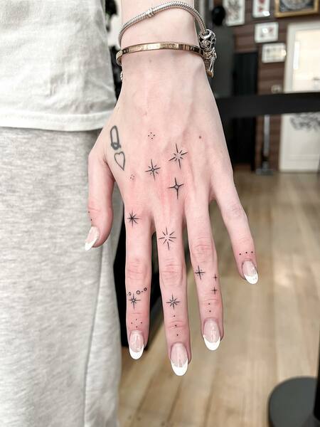 Star Finger Tattoo