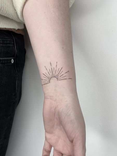 Sun Wrist Tattoo