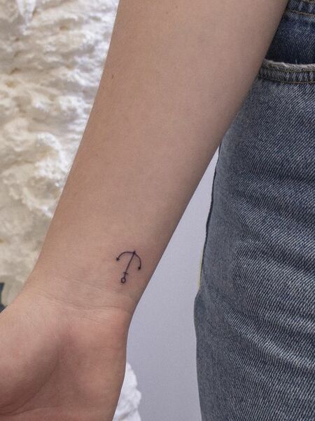 Tiny Anchor Tattoo