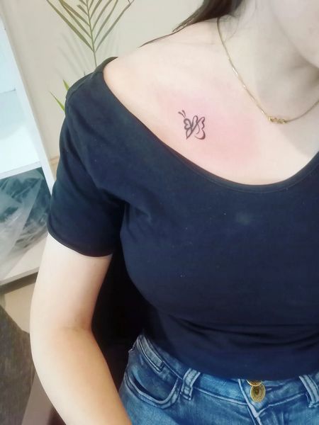 Tiny Collarbone Tattoo