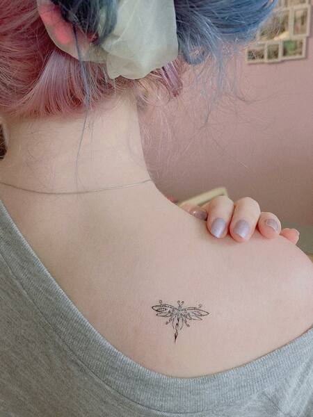 Tiny Dragonfly Tattoo