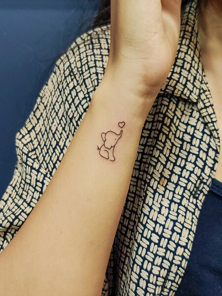 Tiny Elephant Tattoo