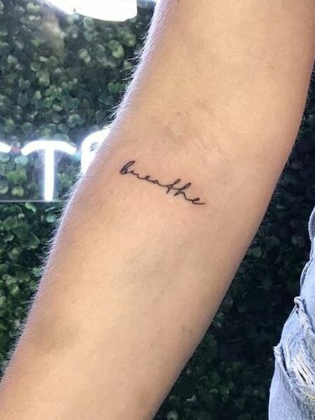 Tiny Quote Tattoo