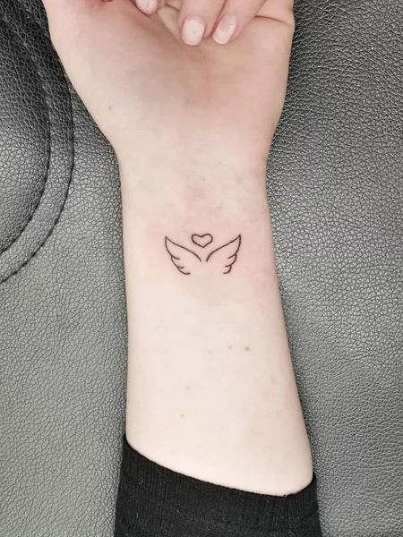 Tiny Wrist Tattoo