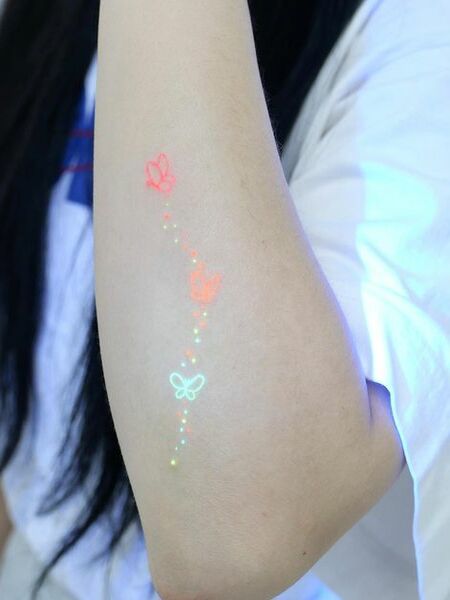 UV Butterfly Tattoo