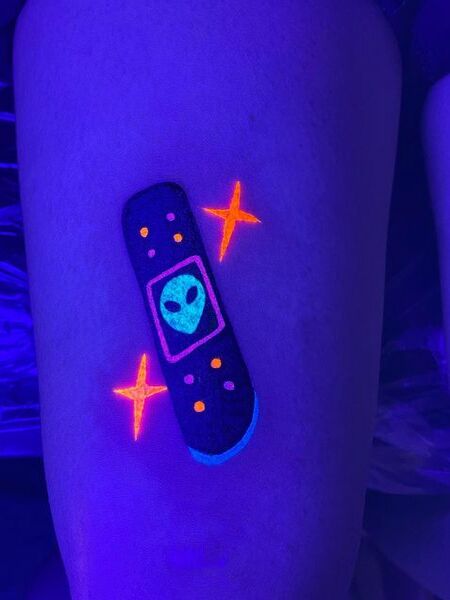 UV Leg Tattoo