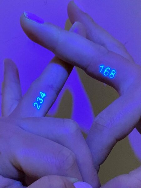 UV Numeral Tattoo