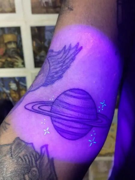 UV Saturn Tattoo