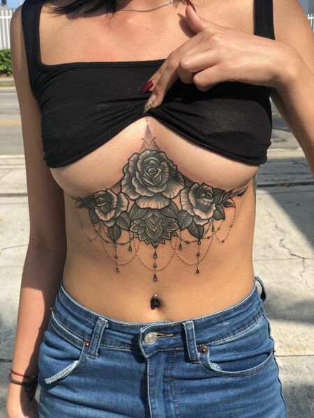 Under Chest Tattoo