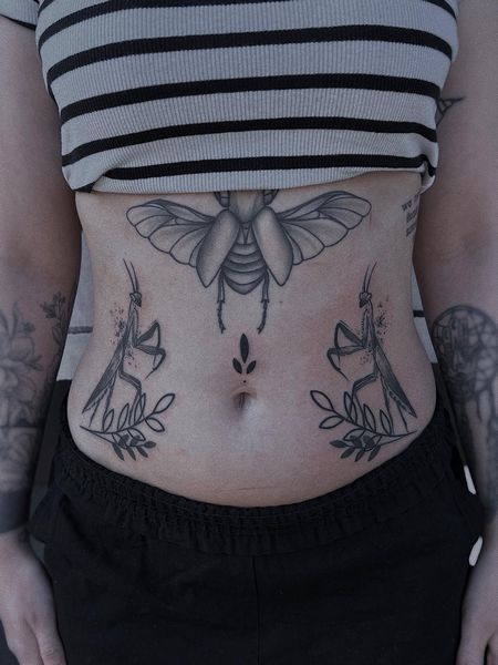 insect Belly Tattoo