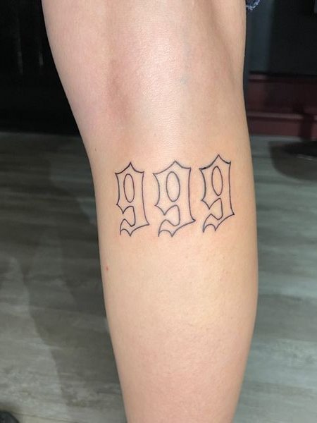 999 Tattoo On Leg