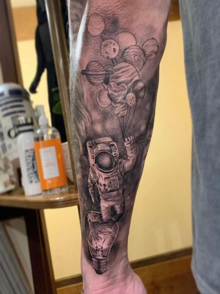 Astronaut Tattoo on Arm