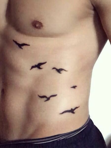 Bird Rib Tattoo