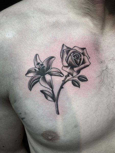 Black Rose Tattoo On Chest
