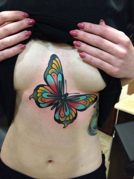 Butterfly Sternum Tattoo