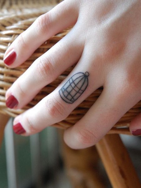 Bird Cage Finger Tattoo