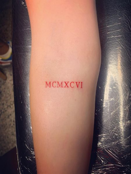 Colorful Roman Numeral Tattoo