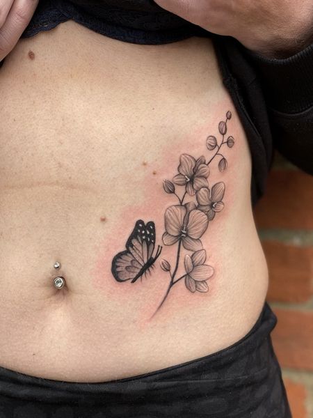 Feminine Belly Tattoo