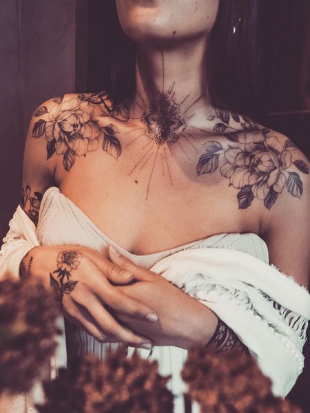 Feminine Chest Tattoo