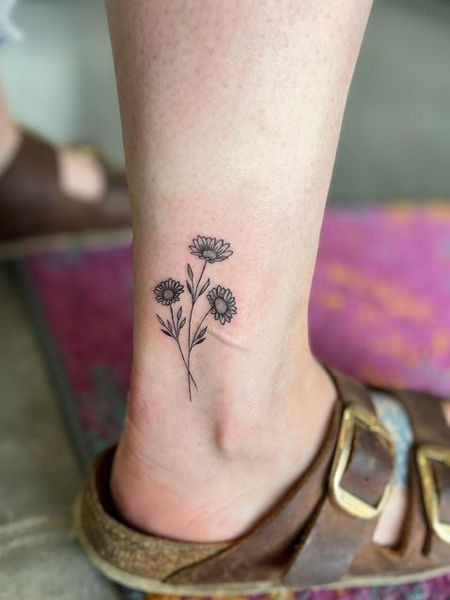 Feminine Daisy Tattoo