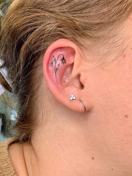 Feminine Ear Tattoo