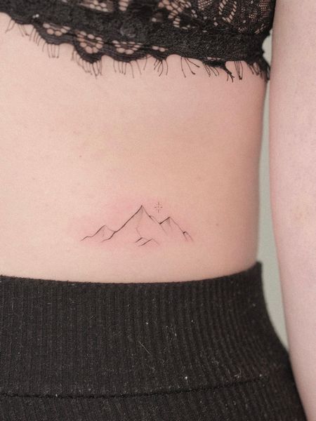 Feminine Mountain Tattoo