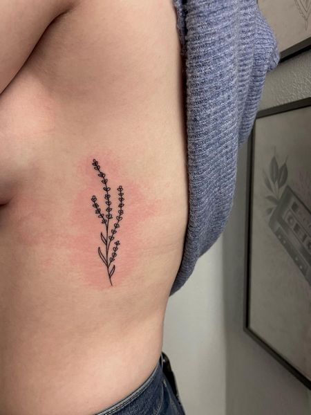 Feminine Rib Tattoo