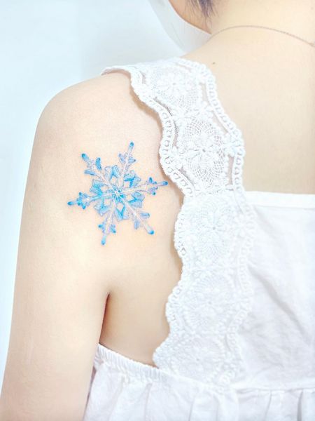 Feminine Snowflake Tattoo