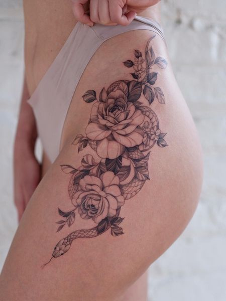 Feminine Thigh Tattoo